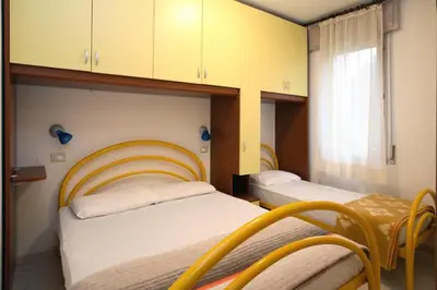 Letto o letti in una camera di Villa Medea