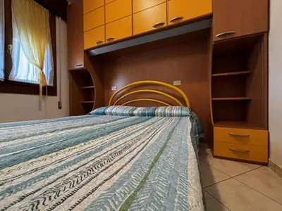 Letto o letti in una camera di Renovated apartment in Rosolina