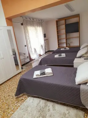 Letto o letti in una camera di Sweet House