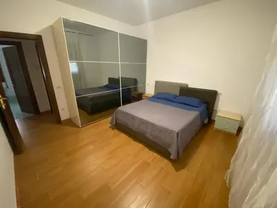 Letto o letti in una camera di Casa Tranquilla vicino al Centro