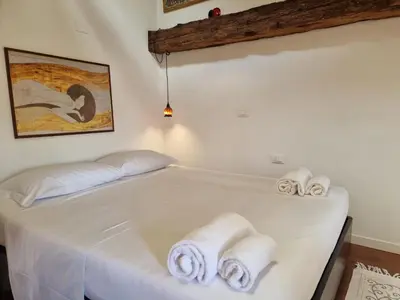 Letto o letti in una camera di BIENNALE TERRACE