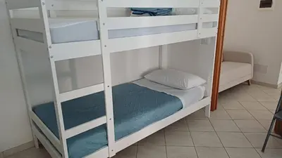Letto o letti in una camera di Casa Celeste