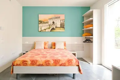 Letto o letti in una camera di monolocale incantevole