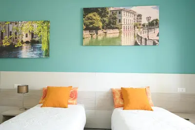 Letto o letti in una camera di Residence Diamante