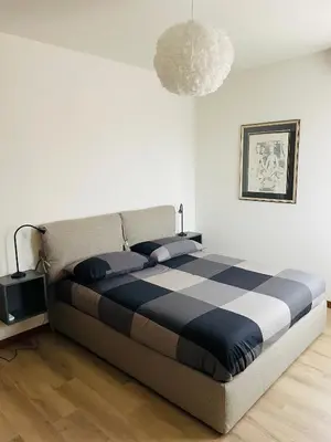 Letto o letti in una camera di Accogliente appartamento in centro