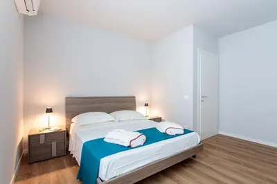 Letto o letti in una camera di Antica Pusterla Maison de Charme