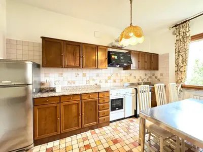 Cucina o angolo cottura di Appartamenti Ca delle Rose - Carraro Immobiliare - Family Apartments