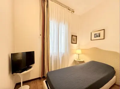 TV o dispositivi per l'intrattenimento presso Appartamenti Ca delle Rose - Carraro Immobiliare - Family Apartments