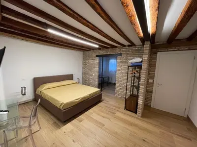 Letto o letti in una camera di Loft for couples close to the Ghetto