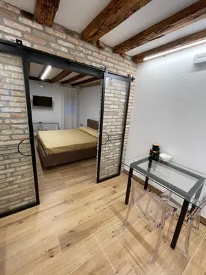 Letto o letti in una camera di Loft for couples close to the Ghetto