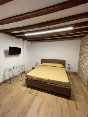 Letto o letti in una camera di Loft for couples close to the Ghetto