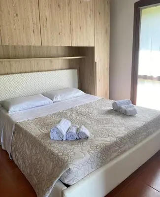 Letto o letti in una camera di Residenza Diana