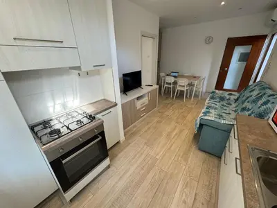 Cucina o angolo cottura di App4rent appartamenti Primavera - 2 family apartments