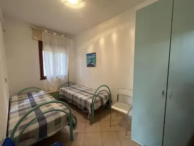 Letto o letti in una camera di Apartment Solaris-5 by Interhome