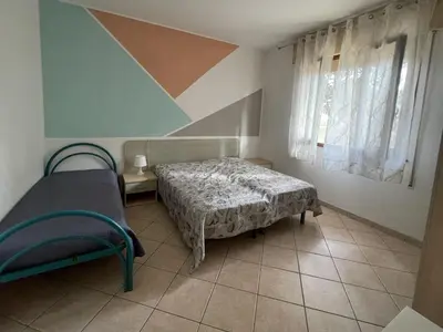 Letto o letti in una camera di Apartment Solaris-3 by Interhome