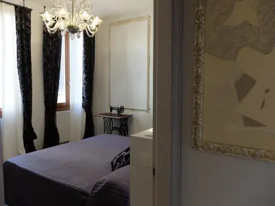 Letto o letti in una camera di San Marco NEW luxury Muneghe