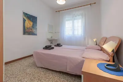 Letto o letti in una camera di Jesolo Lido Free Parking - 4 Guests - Near Beach - app 3