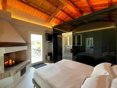 Letto o letti in una camera di Jesolo Luxury Suites