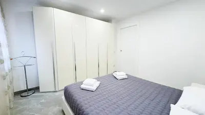 Letto o letti in una camera di Casa Venturini by Ca-Sa Check