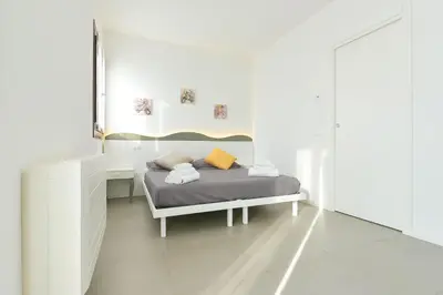 Letto o letti in una camera di Queen Venice Fly Apartments