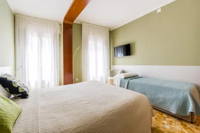 Letto o letti in una camera di Ca del Bezzo - Comfort & City View