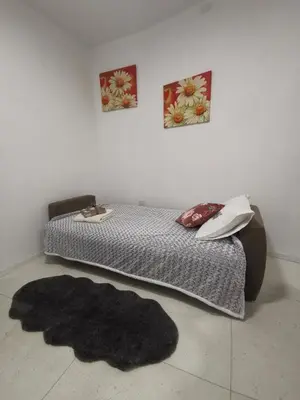 Letto o letti in una camera di Urban Home