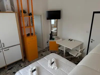 Letto o letti in una camera di Host in Italy - 200m from the sea, beach place included