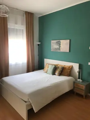 Letto o letti in una camera di Modern big flat Mestre FS Venice