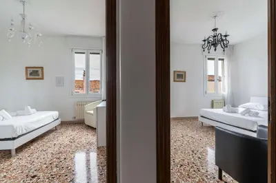 Letto o letti in una camera di Ca' Misericordia
