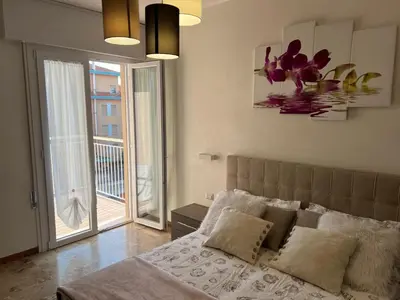 Letto o letti in una camera di Residence Alba d'Oro solo Famiglie e Coppie
