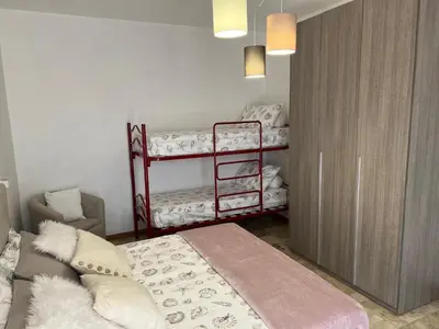 Letto o letti in una camera di Residence Alba d'Oro solo Famiglie e Coppie