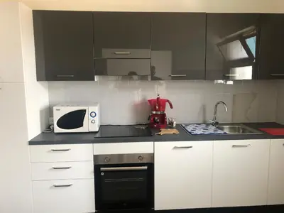 Cucina o angolo cottura di A due passi dal mare - Family Apartment