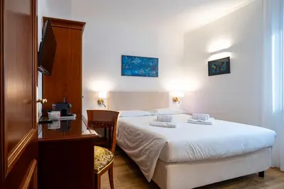 Letto o letti in una camera di Alloggi Marinella