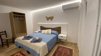 Letto o letti in una camera di Magnolia 41