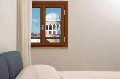 Letto o letti in una camera di Ca' Vittoria, a different way to stay in Venice
