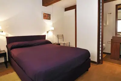 Letto o letti in una camera di Ca' della Tana charming apartment in Biennale area