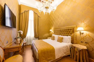 Letto o letti in una camera di Palazzo dei Mori