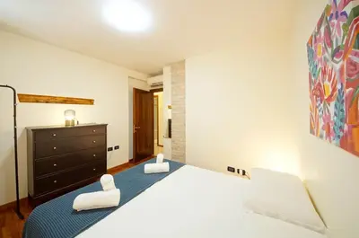 Letto o letti in una camera di DolceVita Apartments N 519 Biennale