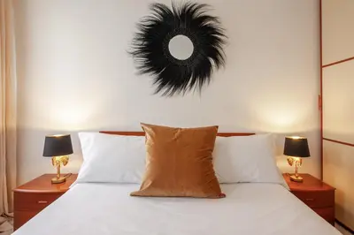 Letto o letti in una camera di CALCEDONIO House by Sleep in MURANO