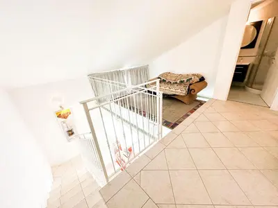 Letto o letti in una camera di Piscina - RESIDENCE ANTENORE