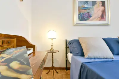 Letto o letti in una camera di QUEEN HOME Isabel
