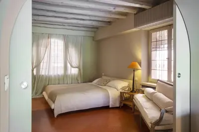 Letto o letti in una camera di Rio Barnaba Giardino - LOCAPPART
