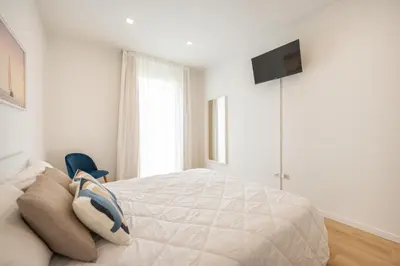 Letto o letti in una camera di Wave Island MD F4