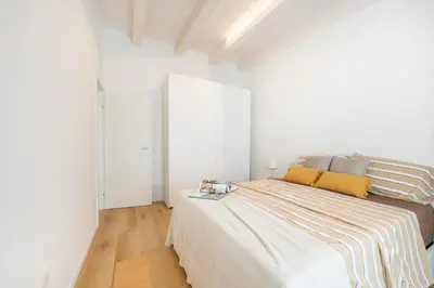 Letto o letti in una camera di Wave Island Batt E18