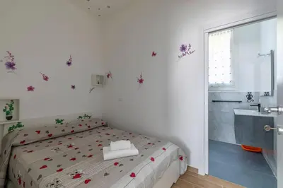 Letto o letti in una camera di Ca' Dandy Large by WelcHome