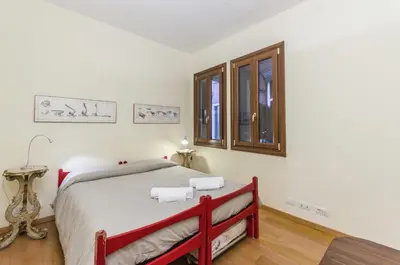 Letto o letti in una camera di Andreina Home