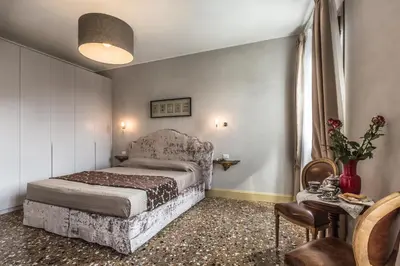 Letto o letti in una camera di Palazzina Canal