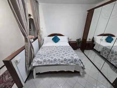 Letto o letti in una camera di Arham Guesthouse Bembo 11
