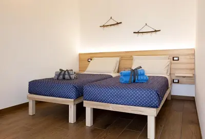 Letto o letti in una camera di B&B Bagni di sole
