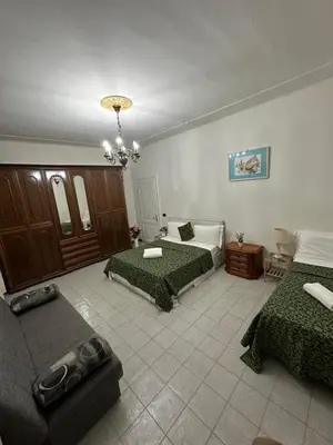 Letto o letti in una camera di Arham Guesthouse Bembo 13